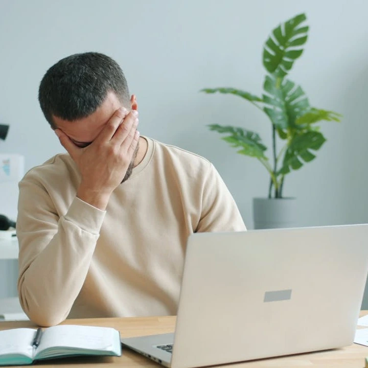 Frustrated user struggling to set up an ecommerce platform for firearm sales